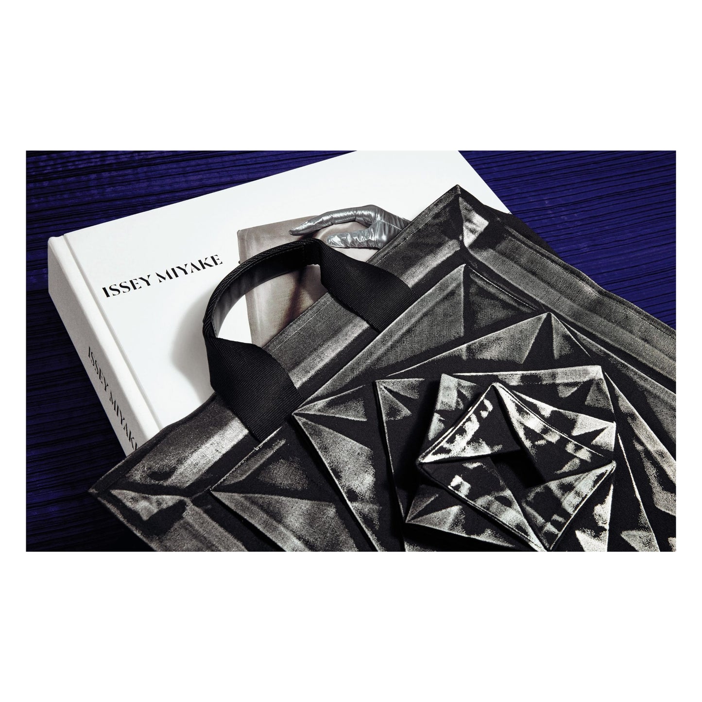 Issey Miyake (English, Japanese) (AP)