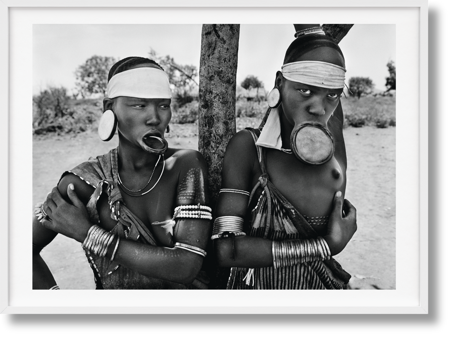 Sebastião Salgado. GENESIS, Art Edition No. 1–100 ‘Two Mursi Women, Omo Valley, Ethiopia’ (English) (AP)