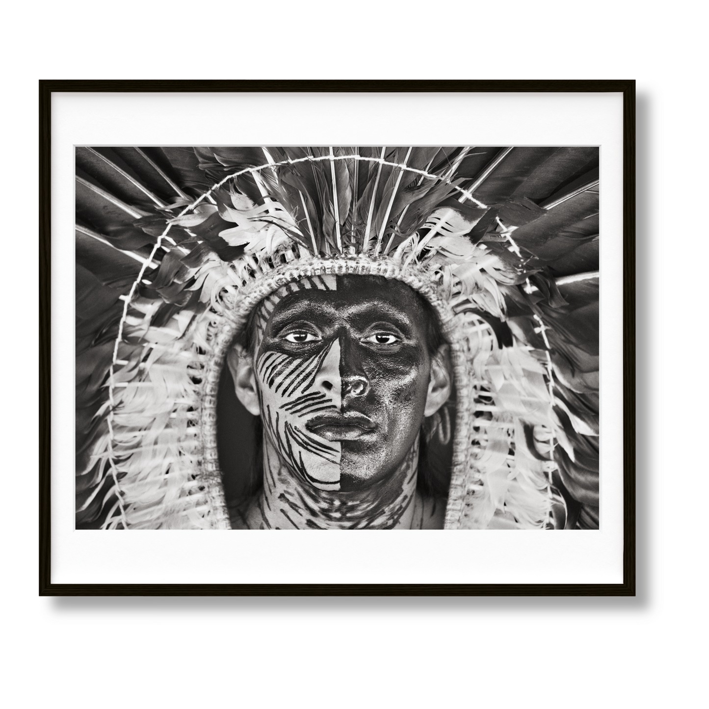 Sebastião Salgado. Amazônia, Art Edition No. 1–100 ‘Adão Yawanawá in a headdress of eagle feathers’ (English)